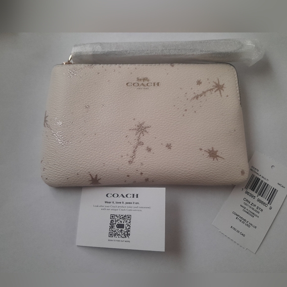 Coach Handbags - New Coach Wristlet With Star Print NWT